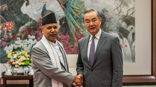 Nepal's Vice President Ram Sahay Prasad Yadav shakes hands with Wang Yi (R), a member of the Political Bureau of the Communist Party of China Central Committee and director of the Office of the Central Commission for Foreign Affairs, in Kunming, southwest China's Yunnan Province, August 16, 2023. /Chinese Foreign Ministry