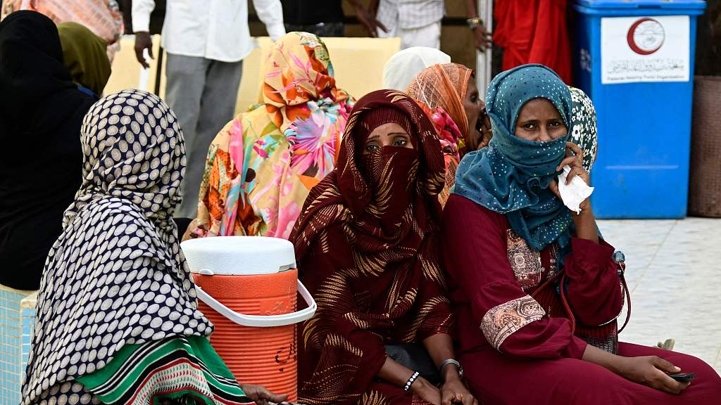 Sudanese women wait at a hospital in Port Sudan on August 13, 2023. /CFP