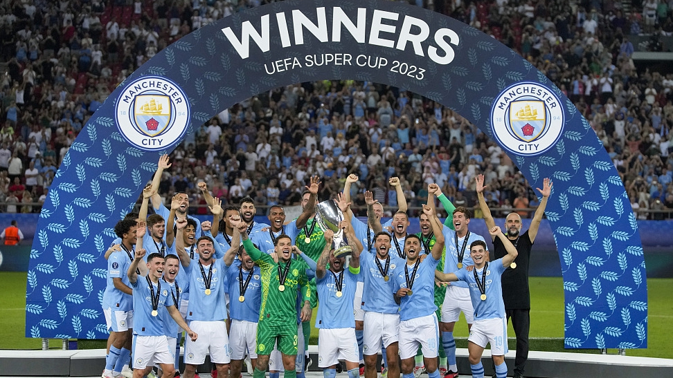 Manchester City players celebrate after winning the UEFA Super Cup at Georgios Karaiskakis stadium in Piraeus port, Athens, Greece, August 16, 2023. /CFP