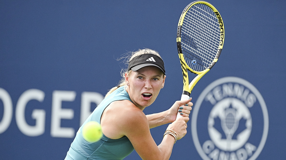 Caroline Wozniacki returns the ball during a second round match at WTA National Bank Open at IGA Stadium in Montreal, Canada, August 9, 2023. /CFP