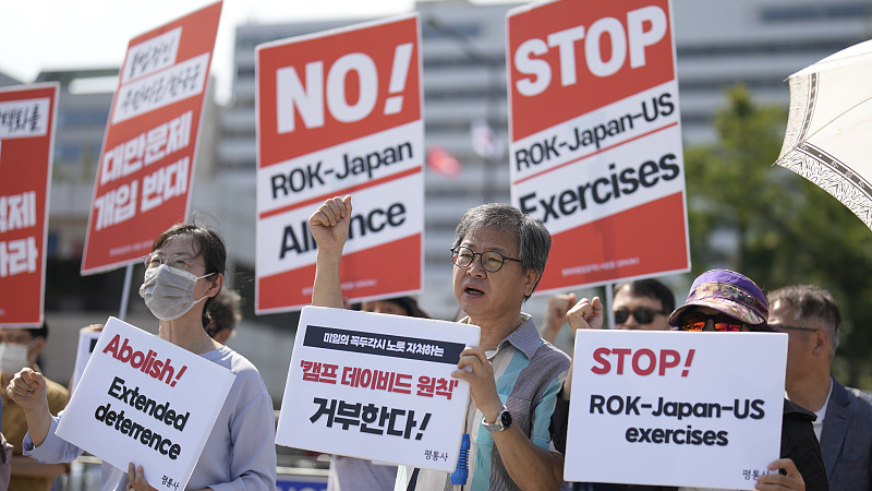 Protesters shout slogans in Seoul, South Korea during a rally ahead of the Camp David trilateral summit, August 17, 2023. /CFP