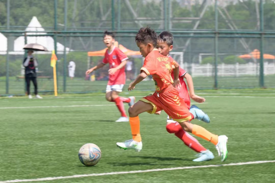 Young players in action during the tournament in Shenyang, China. /Peace Cup