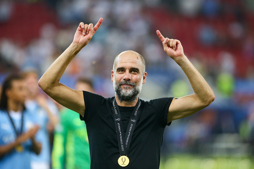 Pep Guardiola, manager of Manchester City, celebrates after the victory over Sevilla in the UEFA Super Cup at Karaiskakis Stadium in Piraeus, Greece, August 16, 2023. /CFP 