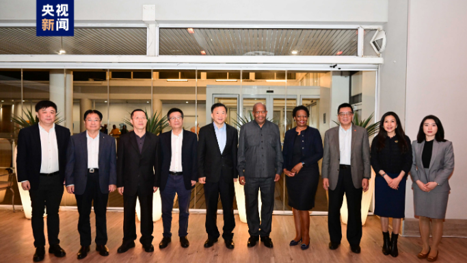 CMG President Shen Haixiong, 5th from the left, and Deputy Speaker of South Africa's National Assembly Solomon Lechasa Tsenoli, 5th from the right, pose for a group photo with other attendees at the signing ceremony of a cooperation agreement between CMG and the MultiChoice Group in Cape Town, South Africa, August 19, 2023. /CMG
