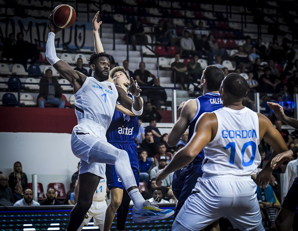 Deandre Ayton (#1) of the Bahamas grabs a rebound in the FIBA Olympic pre-qualifying tournament game against Argentina in Santiago del Estero, Argentina, August 20, 2023. /FIBA