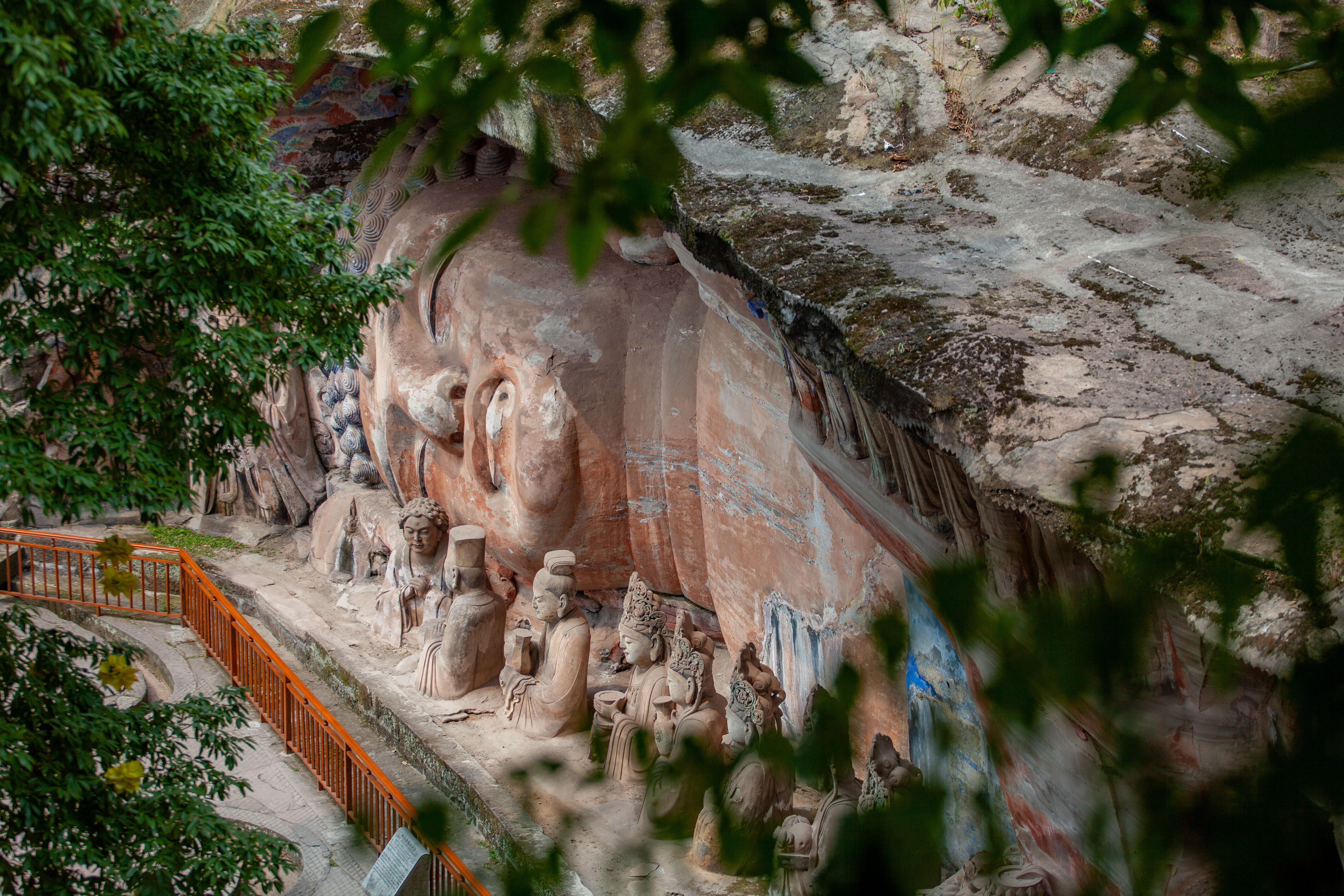 A photo shows the Dazu Rock Carvings, which are made up of tens of thousands of statues featuring delicate figures and patterns, in Chongqing. /CGTN