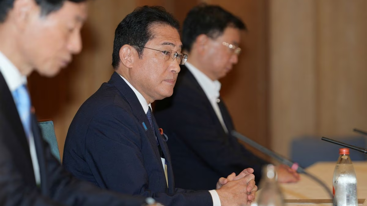 Japanese Prime Minister Fumio Kishida reacts during a meeting with Masanobu Sakamoto, the head of the National Federation of Fisheries Cooperative Associations and others at the prime minister's office in Tokyo, Japan, August 21, 2023. /Reuters
