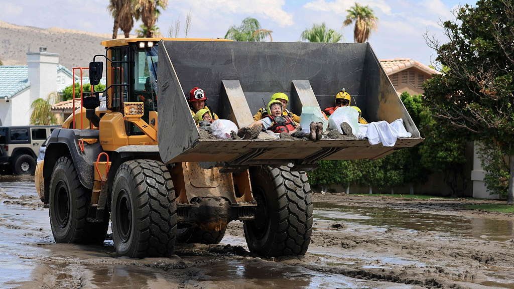 Cathedral City Fire Department rescues residents in a bulldozer following heavy rains from Tropical Storm Hilary in Cathedral City, California, U.S., August 21, 2023. /CFP