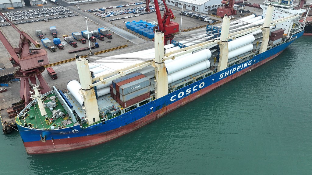 A container ship carrying wind power equipment bound to South Africa from a dock in east China's Jiangsu Province, May 27, 2023. /CFP