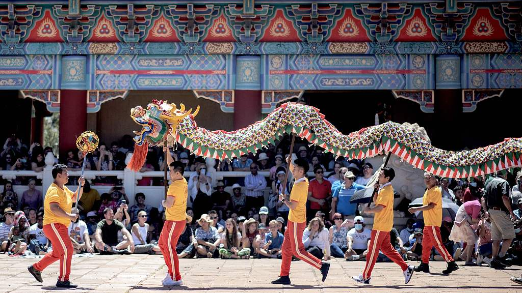 Dancers perform during a traditional Chinese Dragon Dance celebrating the Chinese New Year at the Nan Hua Temple in Bronkhorstspruit, South Africa, January 22, 2023. /CFP