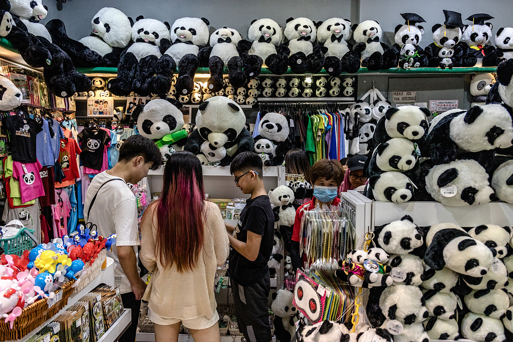 Visitors shop for panda souvenirs to celebrate the 17th birthdays of Xing Xing and Liang Liang at Malaysia National Zoo in Kuala Lumpur on August 23, 2023. /CFP
