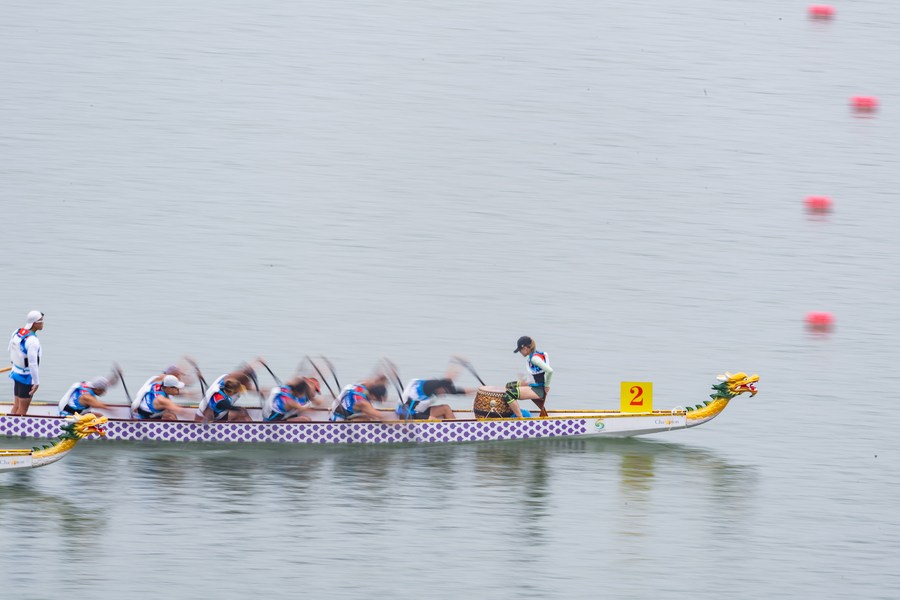 A dragon boat in action during the 2023 International Canoe Federation (ICF) Dragon Boat World Cup held in Yichang, Hubei Province of China on June 22, 2023. /Xinhua