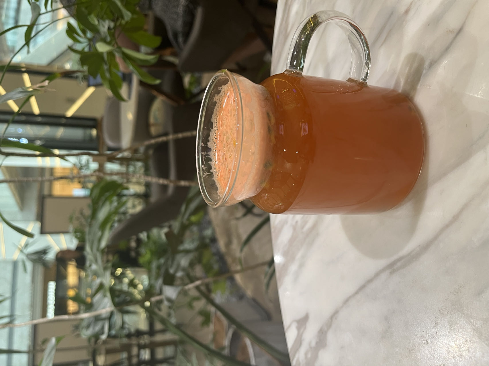 A passion fruit rooibos drink is served at theATRE Cafe. /CGTN
