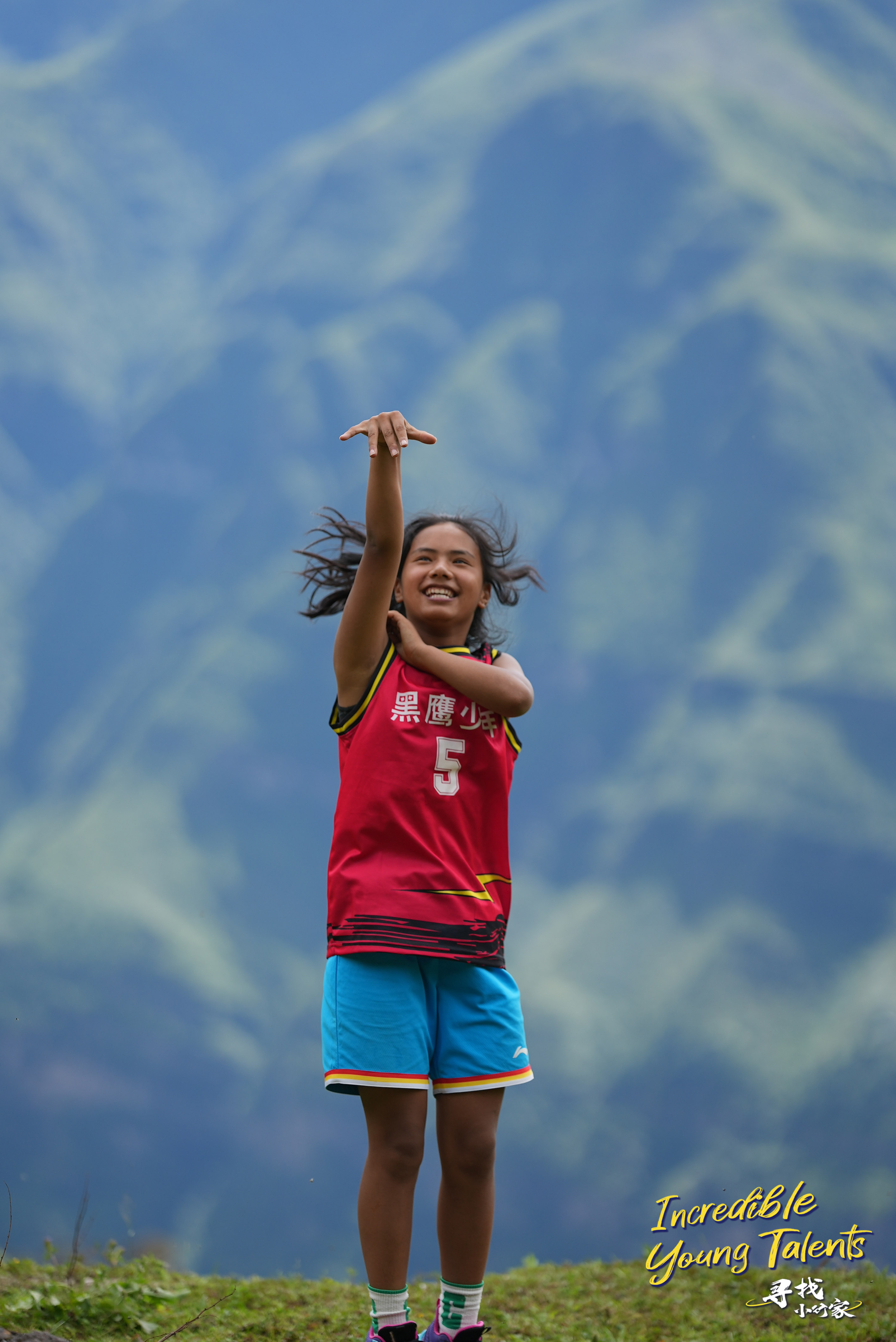 An undated photo shows 13-year-old girl Aguolieha holding onto her hoop dream. Playing for a team called the Blackhawks hailing from the mountainous Liangshan Yi Autonomous Prefecture in southwest China's Sichuan Province, she thinks the sky's the limit. /CGTN