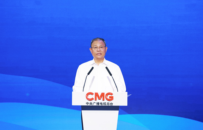 Xue Jijun, a member of China Media Group's editorial board, speaks at the opening ceremony of the first China Beijing Jinhai Lake Regatta was held in Beijing, August 25, 2023. /China Media Group