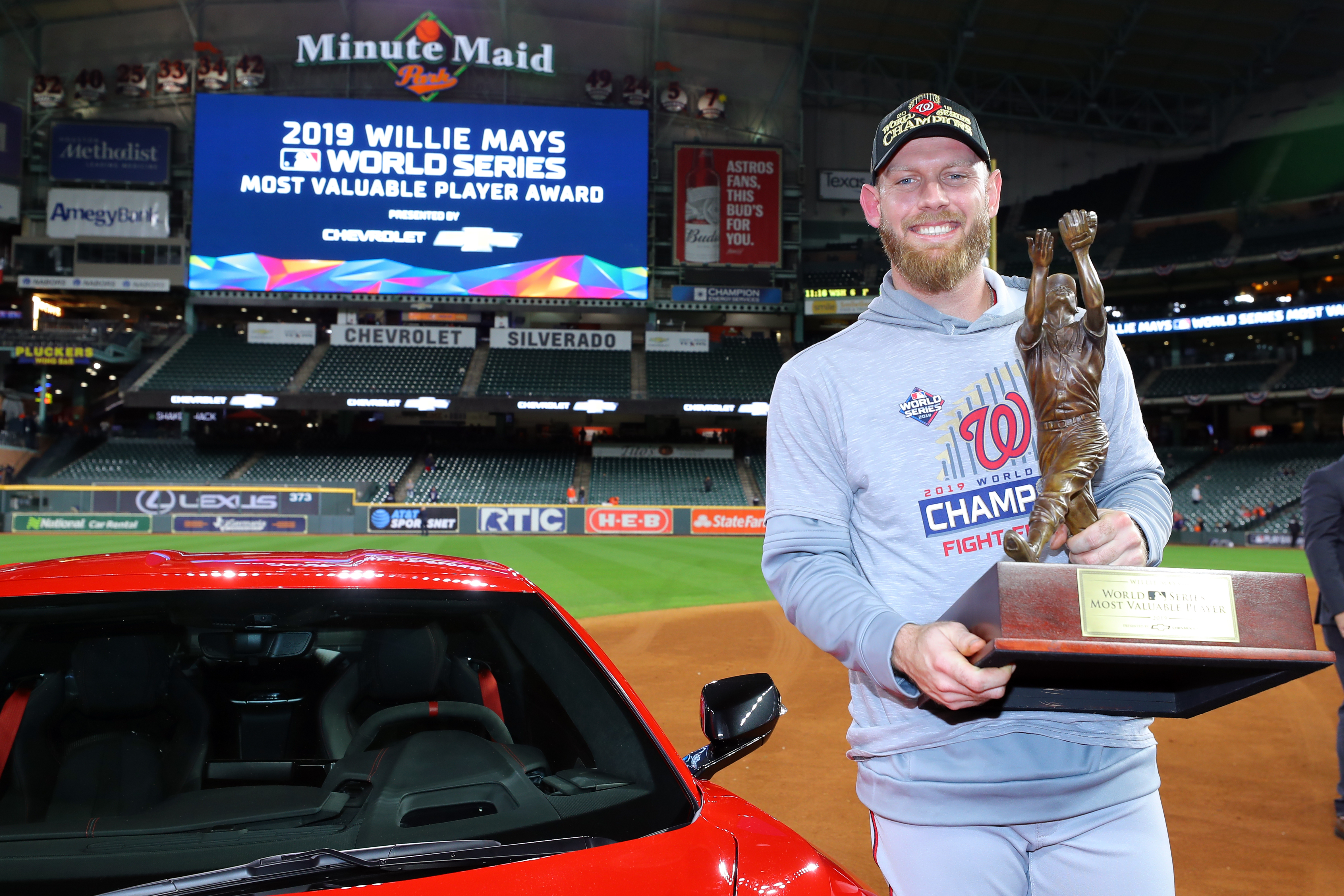 Pitcher Stephen Strasburg of the Washington Nationals receives the Willie Mays World Series MVP Trophy after Game 7 of the World Series against the Houston Astros at Minute Maid Park in Houston, Texas, October 30, 2019. /CFP