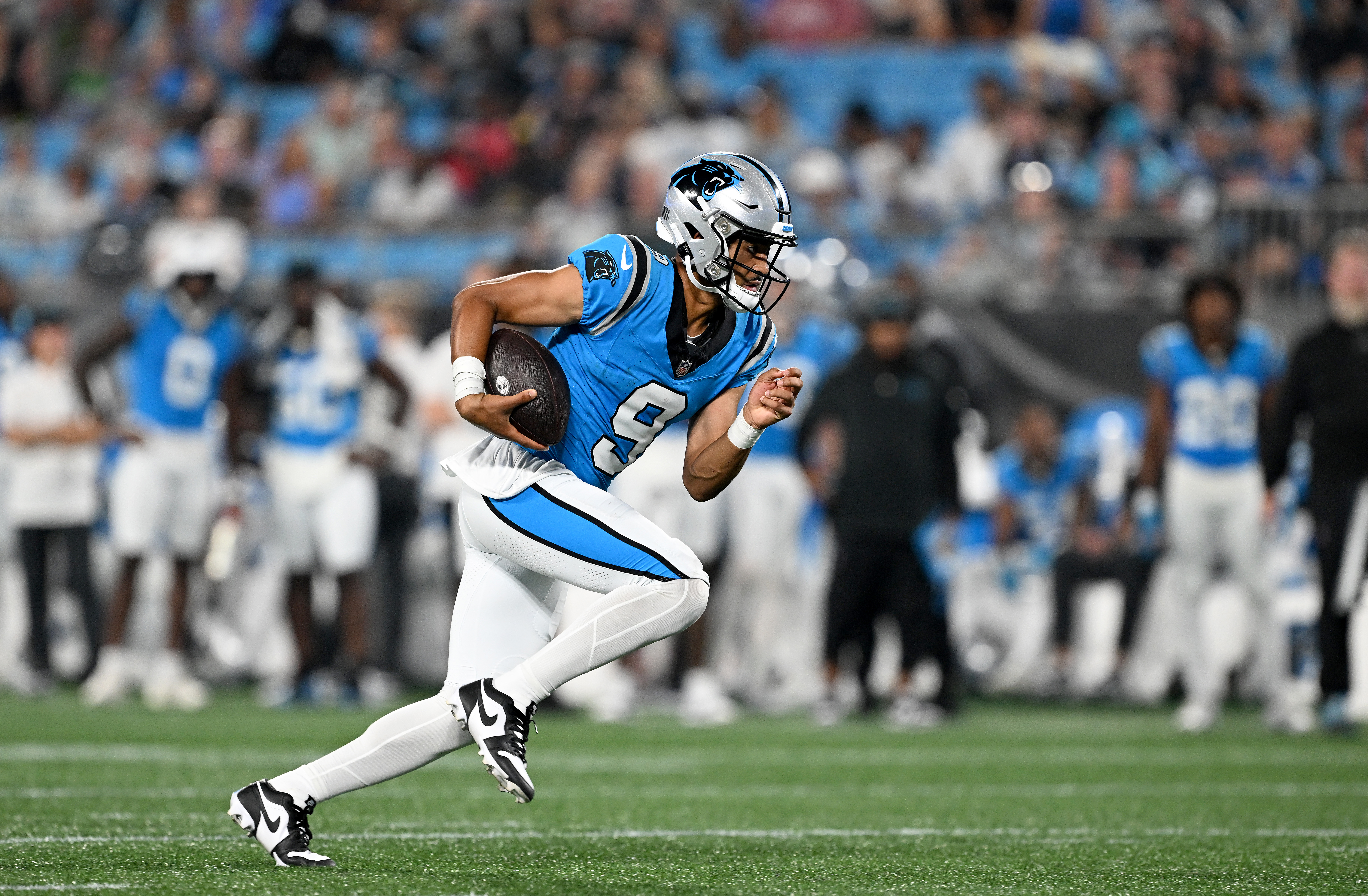 Quarterback Bryce Young of the Carolina Panthers runs with the ball in the pre-season game against the Detroit Lions at Bank of America Stadium in Charlotte, North Carolina, August 25, 2023. /CFP 