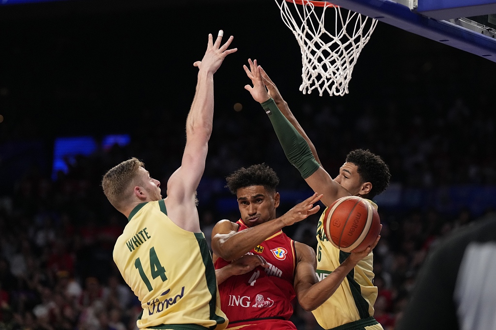 Maodo Lo (C) of Germany passes in the group game against Australia at the FIBA Basketball World Cup at the Okinawa Arena in Okinawa, Japan, August 27, 2023. /CFP