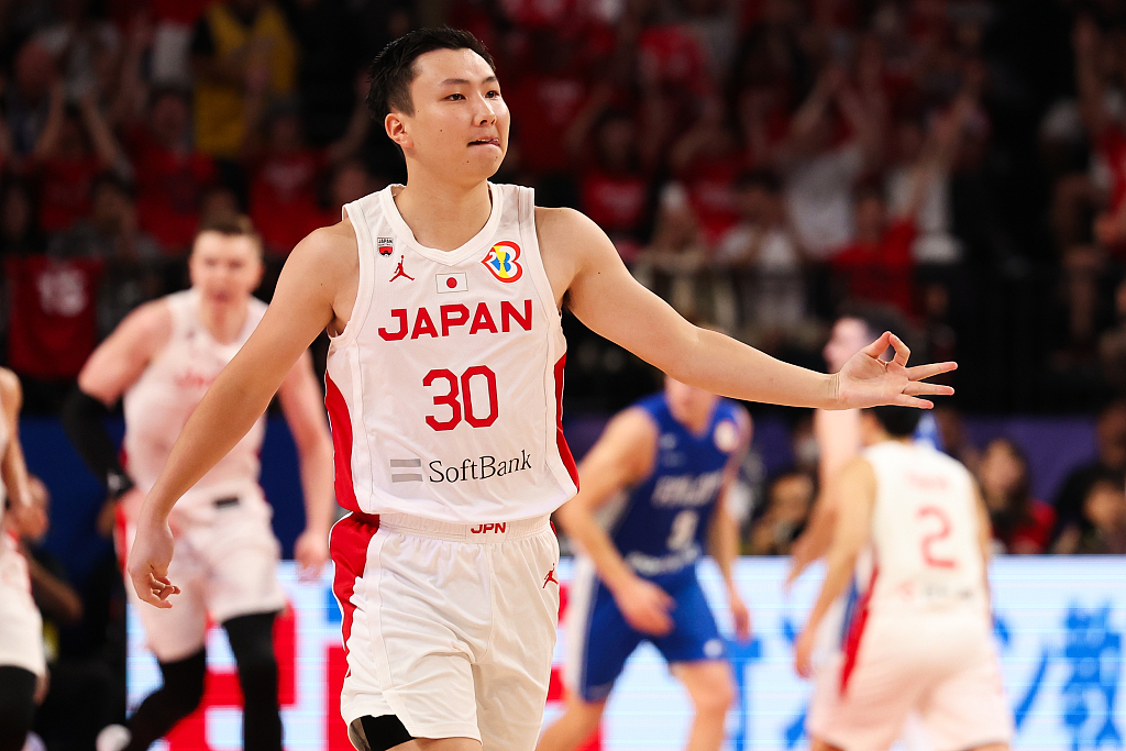 Keisei Tominaga (#30) of Japan reacts after making a 3-pointer in the group game against Finland at the FIBA Basketball World Cup at the Okinawa Arena in Okinawa, Japan, August 27, 2023. /CFP