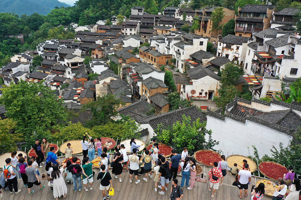 Tourists visit Huangling Village in Wuyuan County, Jiangxi Province, August 26, 2023. /CFP