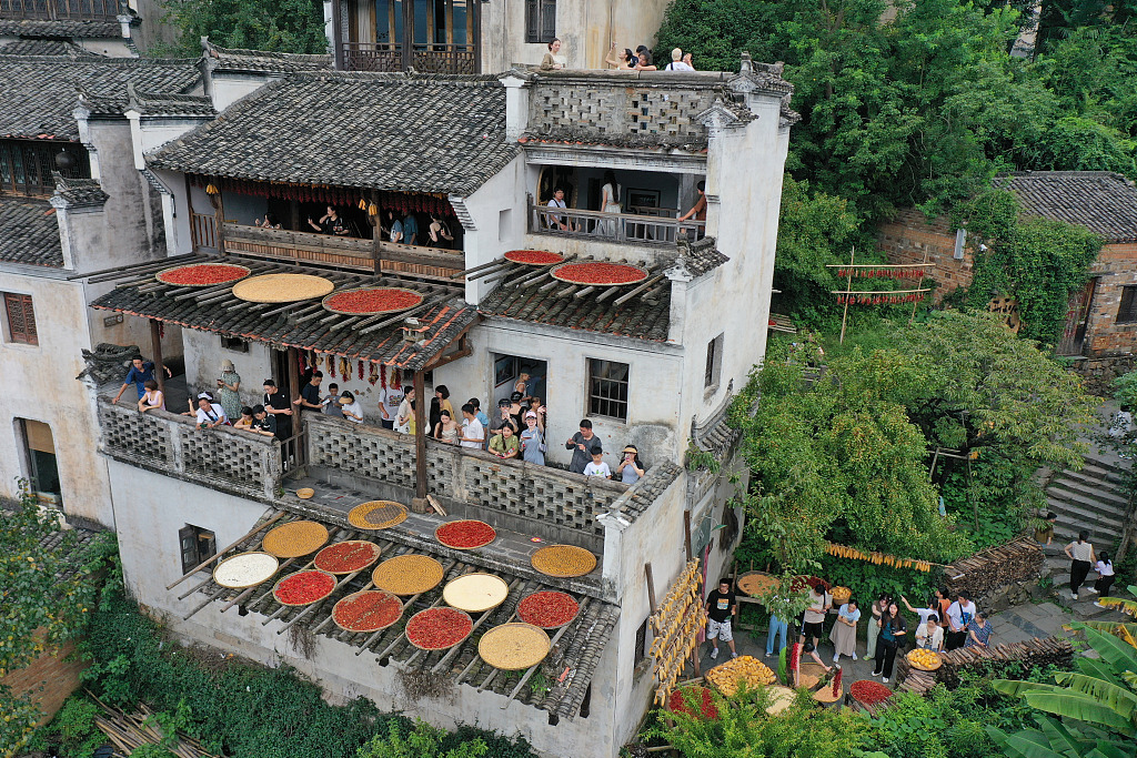 Tourists visit Huangling Village in Wuyuan County, Jiangxi Province, August 26, 2023. /CFP