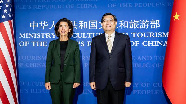Chinese Minister of Culture and Tourism Hu Heping poses photo with visiting U.S. Commerce Secretary Gina Raimondo in Beijing, China, August 29, 2023. /Chinese Ministry of Culture and Tourism