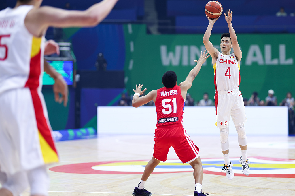 Zhao Jiwei (#4) of China shoots in the group game against Puerto Rico at the FIBA Basketball World Cup at the Araneta Coliseum in Manila, the Philippines, August 30, 2023. /CFP