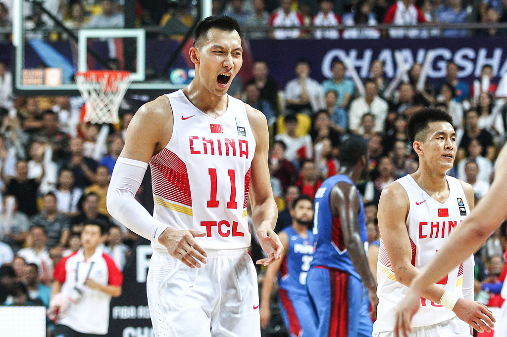 Yi Jianlian celebrates during China's FIBA Asia Cup game against the Philippines in Changsha, China, October 3, 2015. /CFP
