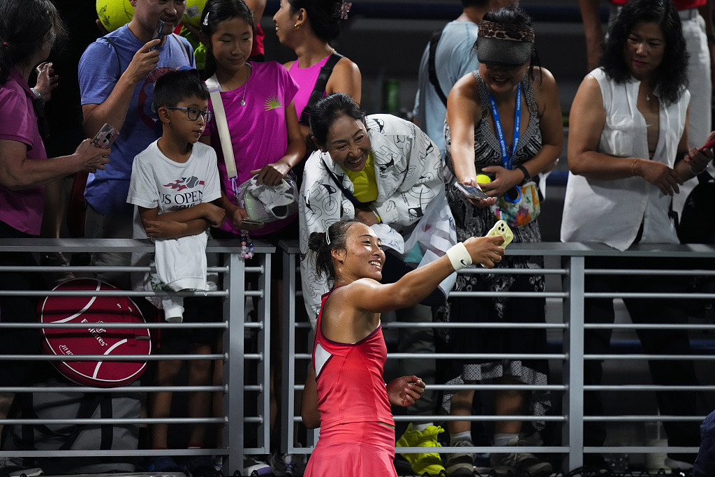 Zheng Qinwen of China poses for a selfie after defeating Nadia Podoroska of Argentina on Day 2 of the U.S. Open at the USTA Billie Jean King National Tennis Center in the Flushing neighborhood of the Queens borough of New York City, U.S., August 29, 2023. /CFP