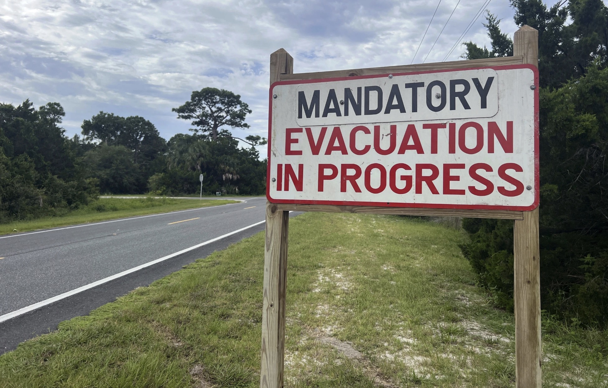 An evacuation sign stands in Cedar Key, Florida, U.S., August 29, 2023. /AP