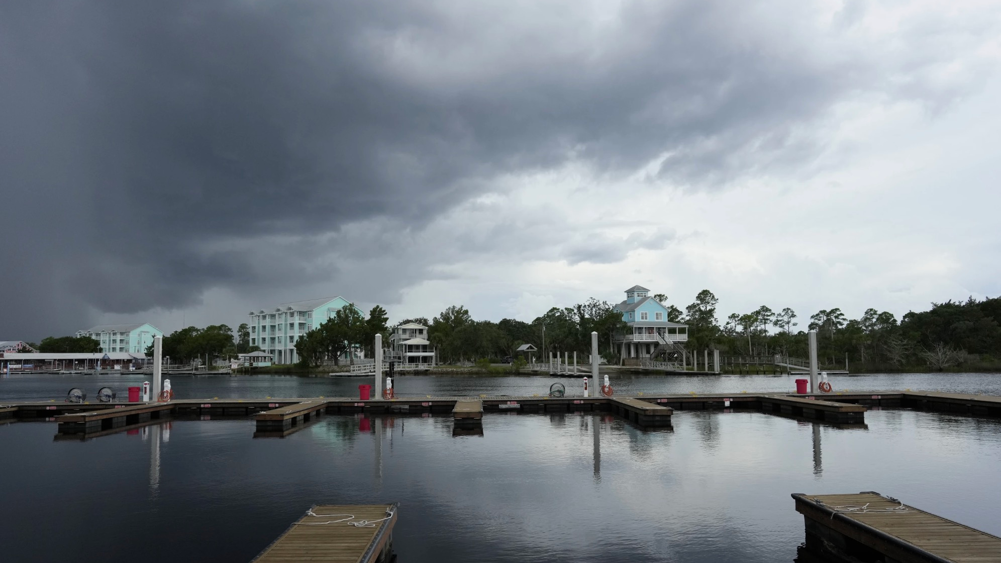 Storm clouds loom over riverfront homes ahead of the expected arrival of Hurricane ldalia in Steinhatchee, Florida, U.S., August 29, 2023. /AP