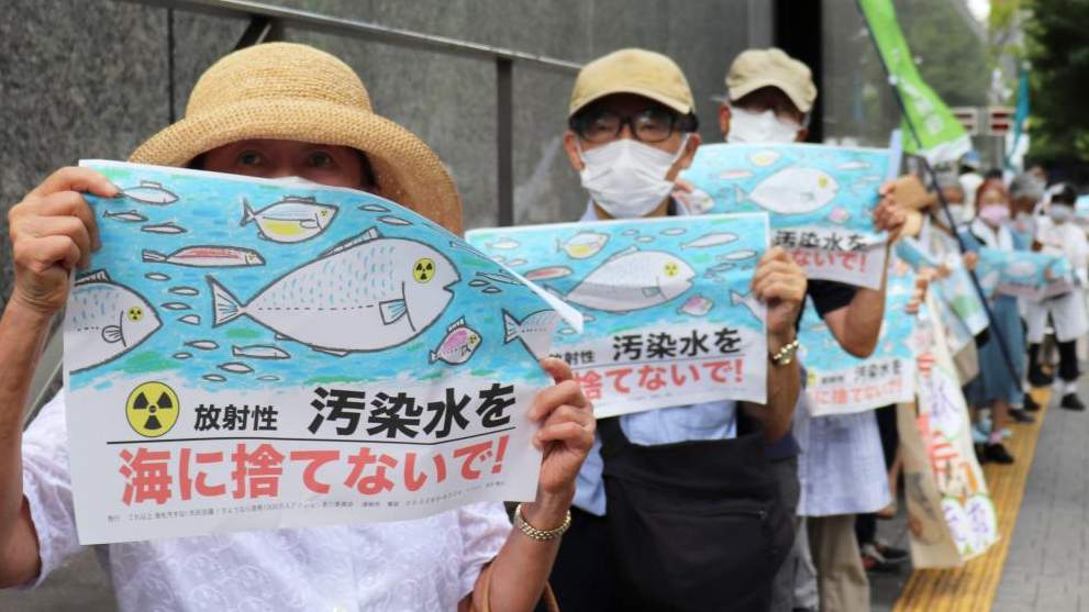 People gather to protest the Japanese government and Tokyo Electric Power Company's (TEPCO) decision on releasing nuclear-contaminated water in front of the headquarters of the TEPCO in Tokyo, Japan, August 24, 2023. /Xinhua