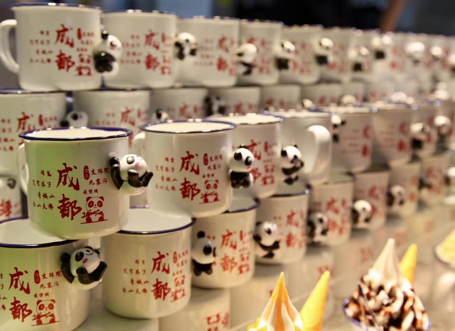 Cups for ice cream are decorated with panda figurines at a store in Jinli Ancient Street in Chengdu, Sichuan Province. /CGTN