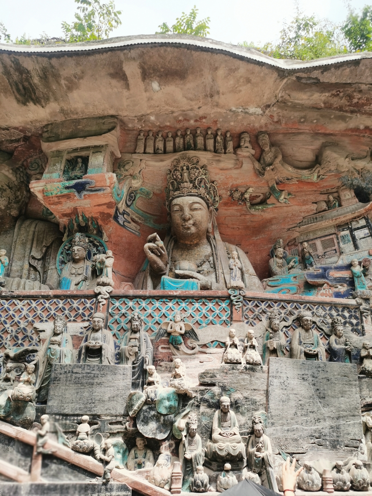 Buddhist sculptures at the Dazu Rock Carvings scenic spot in southwest China's Chongqing are seen in this photo taken on August 22, 2023. /CGTN