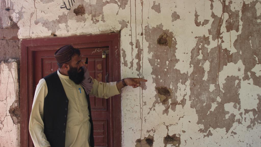 A man shows the damage of a house destroyed by bombs dropped by U.S. forces in Hesarak District of Nangarhar Province, Afghanistan, July 30, 2023. /Xinhua