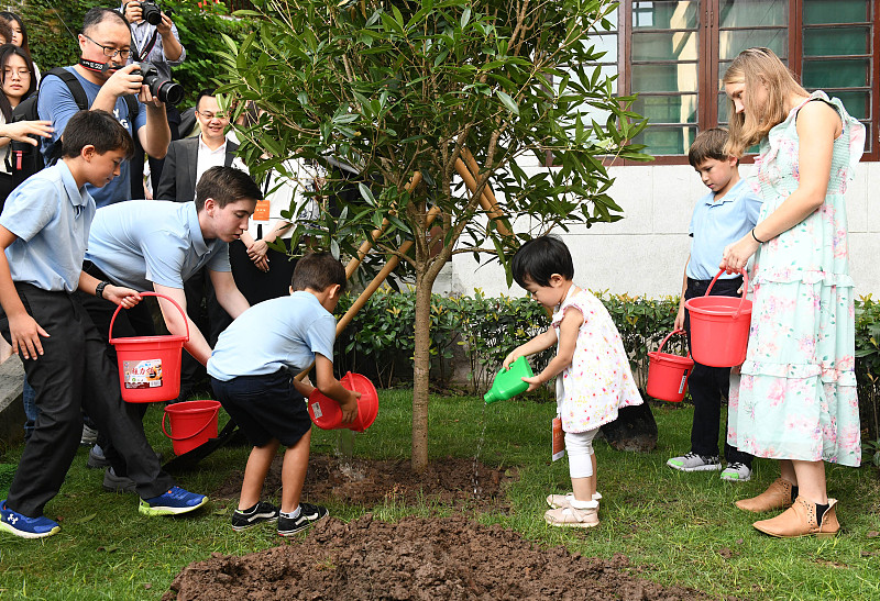 The family of former U.S. General Joseph Stilwell plant a tree commemorating the 140th birthday of the general, organized in southwest China's Chongqing Municipality, August 8, 2023. /CFP