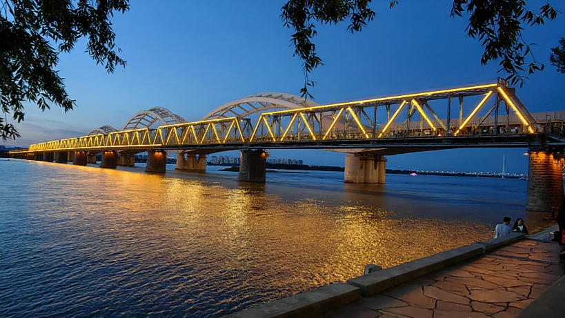 A railway bridge on the Songhua River in Harbin City, northeast China's Heilongjiang Province, August 26, 2023. /CFP
