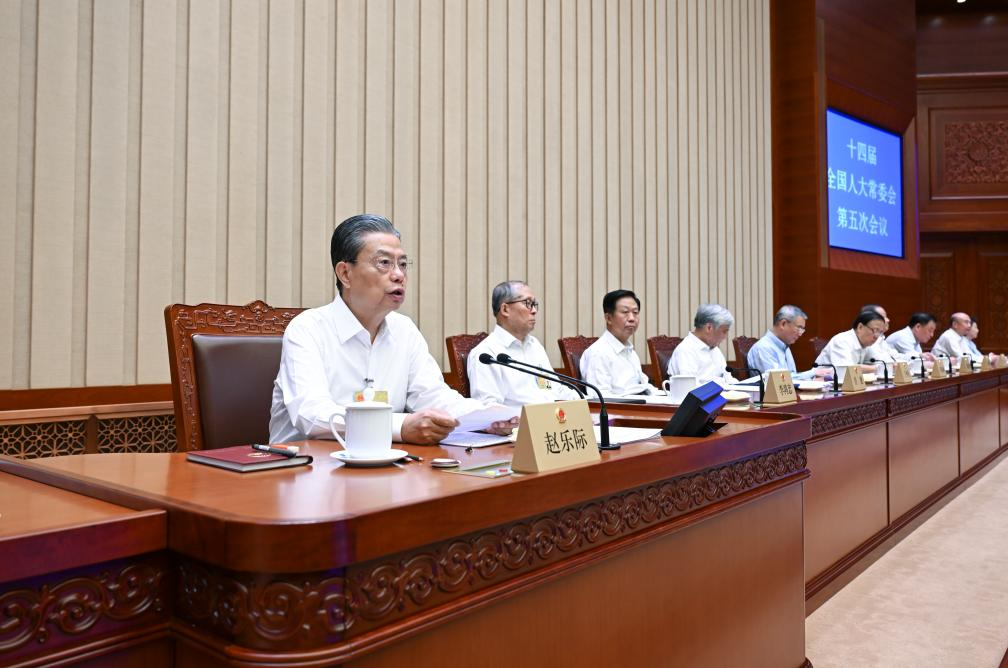 Zhao Leji (L), chairman of the National People's Congress (NPC) Standing Committee, presides over the closing meeting of the fifth session of the 14th NPC Standing Committee at the Great Hall of the People in Beijing, China, September 1, 2023. /Xinhua