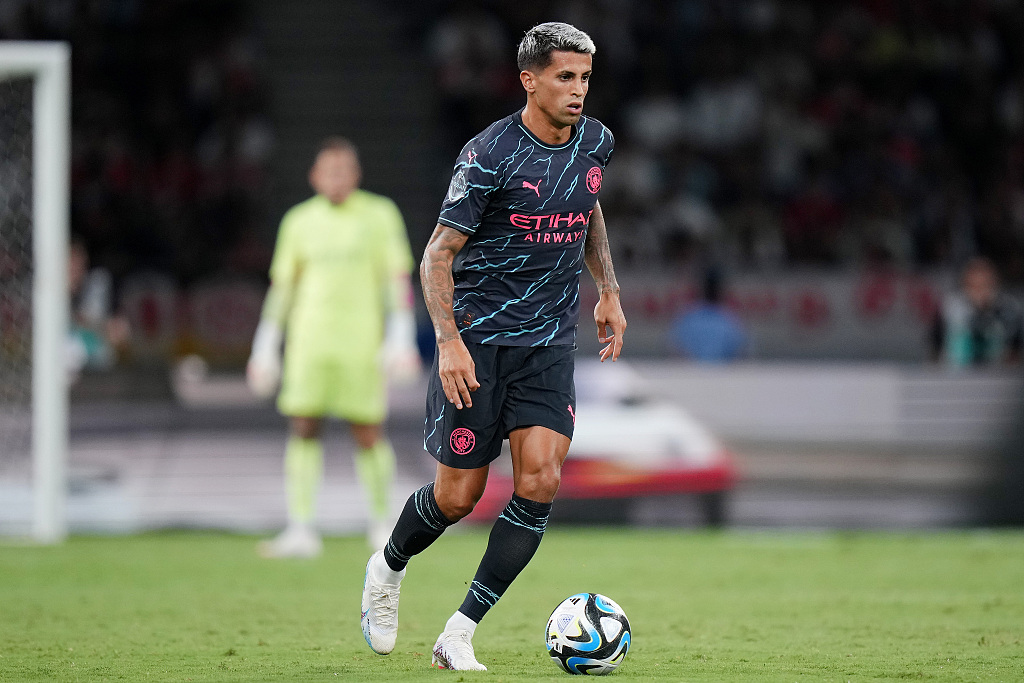 Joao Cancelo of Manchester City controls the ball during the preseason friendly between Manchester City and Bayern Munich in Tokyo, Japan, July 26, 2023. /CFP 