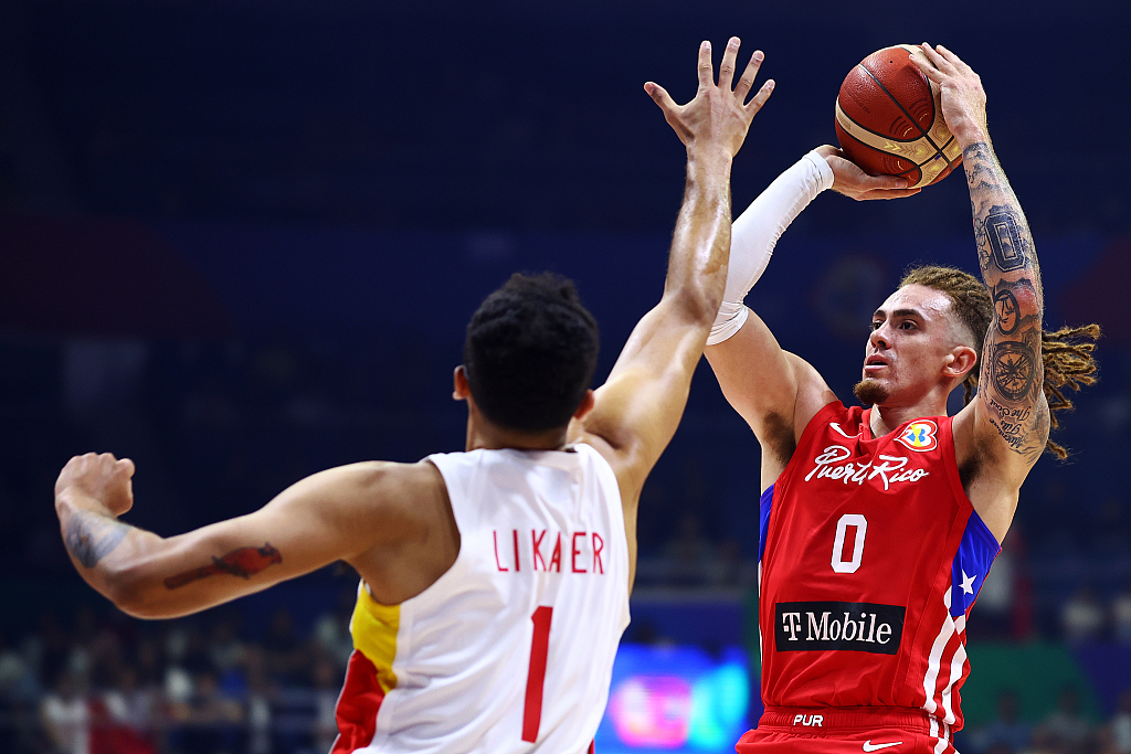 Isaiah Pineiro (#0) of Puerto Rico shoots in the FIBA Basketball World Cup group game against China at Smart Araneta Coliseum in Quezon City, the Philippines, August 30, 2023. /CFP