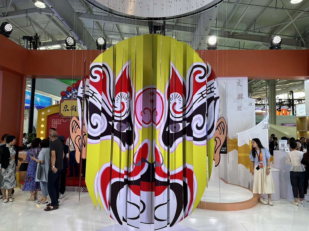 A large-scale art installation featuring Peking Opera facial makeup is seen on display at the China International Fair for Trade in Services in Beijing on September 2, 2023. /CFP