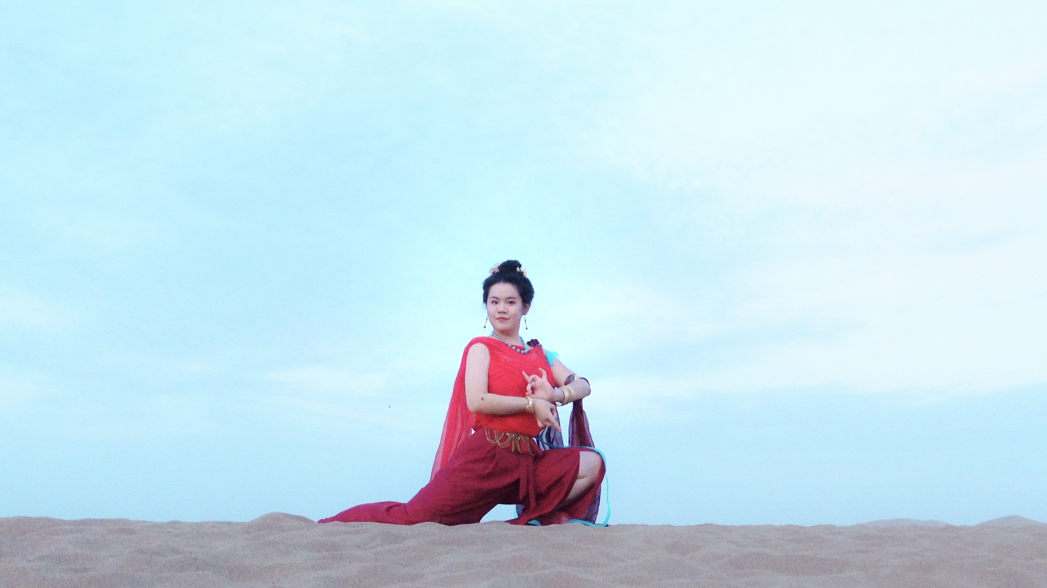 Su Mo in costume of a Flying Apsara, Dunhuang, northwest China's Gansu Province, September 4, 2023. /Courtesy of Su Mo