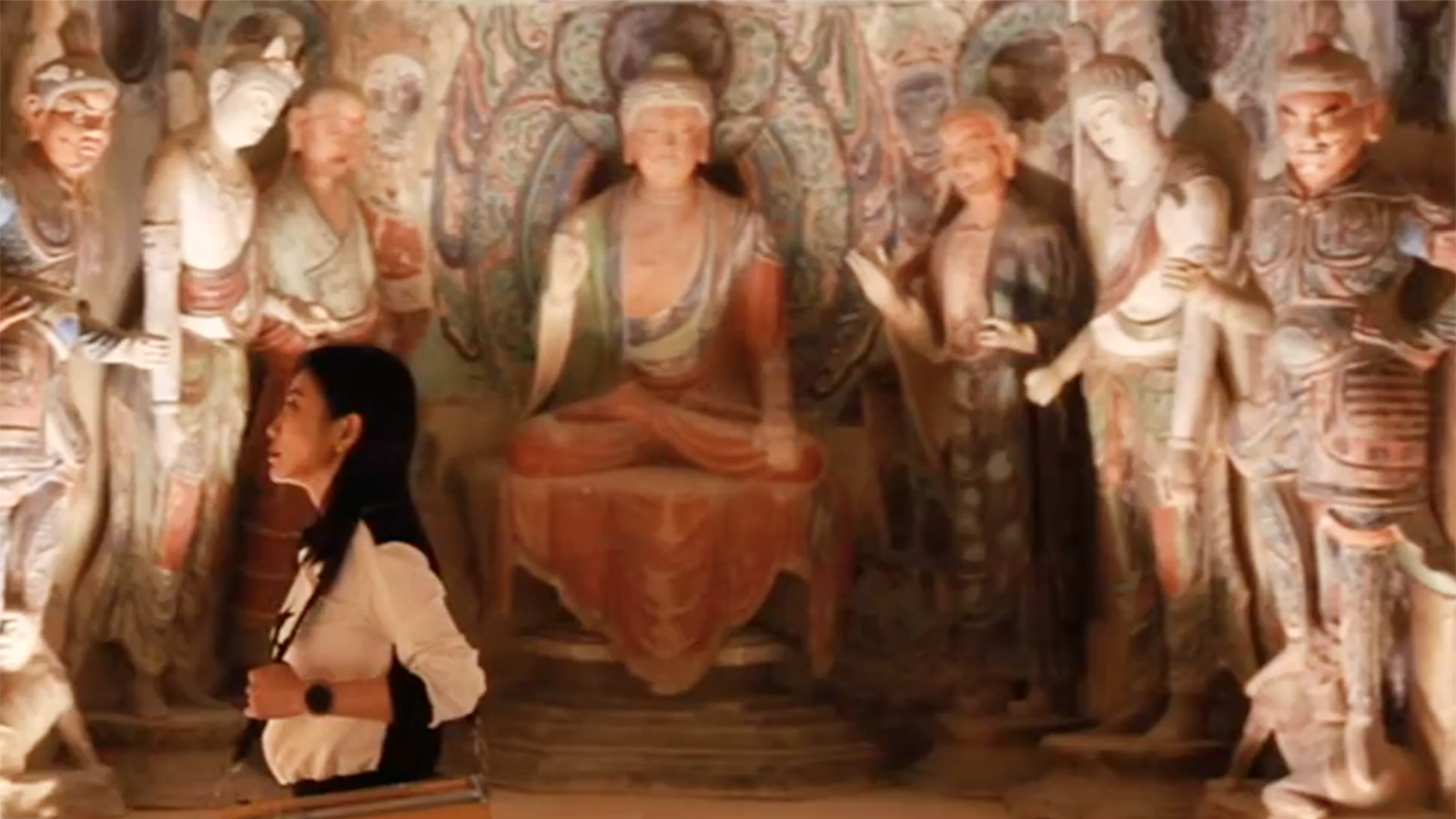 Mi Qiaoming visits an exhibition featuring Dunhuang art held in Beijing. /CGTN