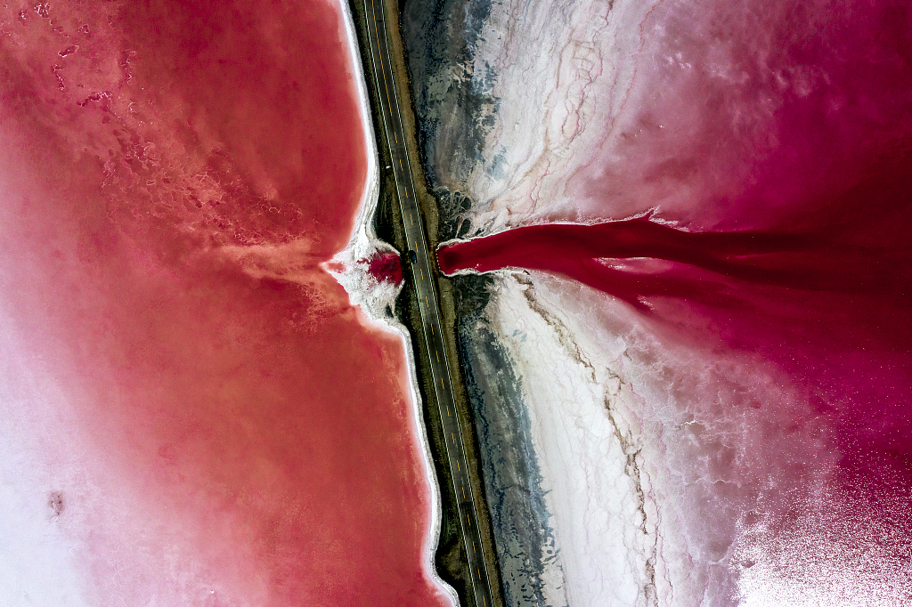 A photo taken on August 27, 2023 shows the pink waters of Tuolekule Lake in Hami, Xinjiang. /CFP