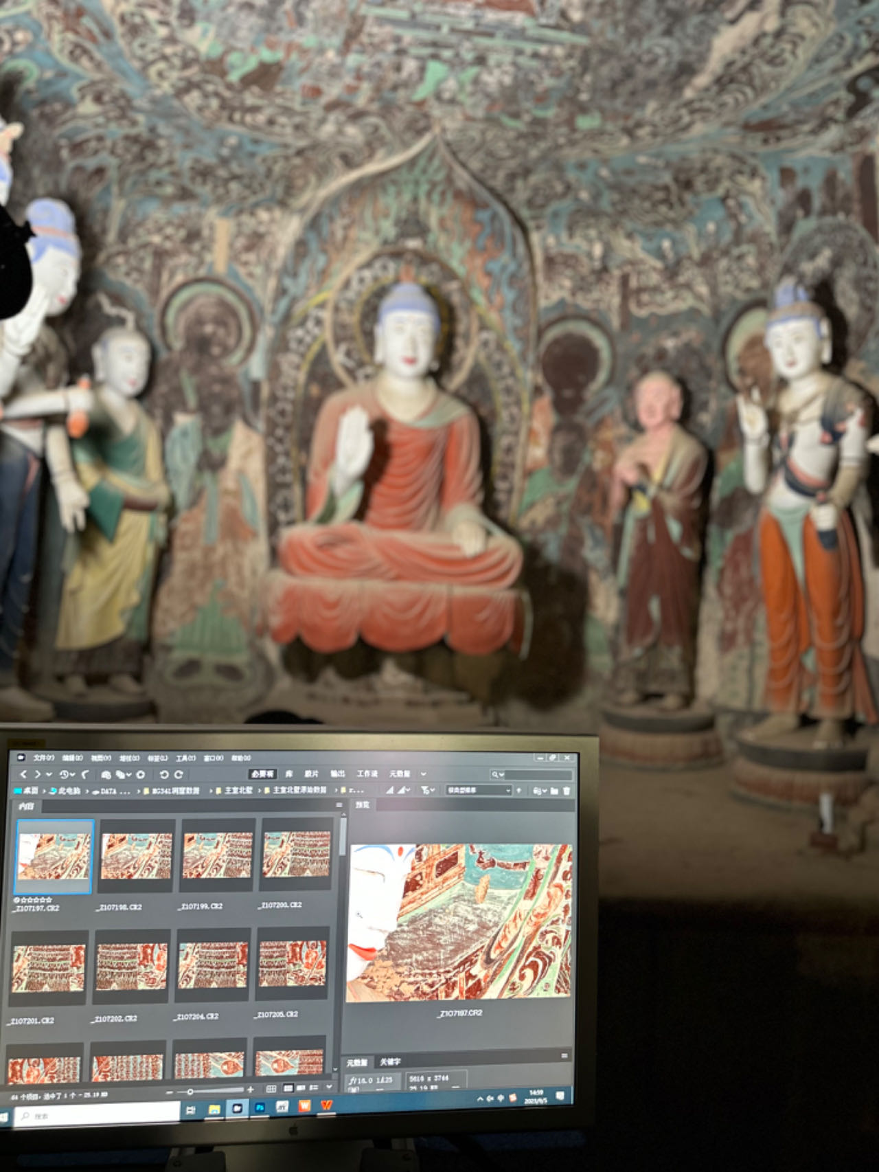 A photo taken on September 5, 2023 shows digital images of a cave at the Mogao Grottoes in Dunhuang, Gansu Province. /CGTN