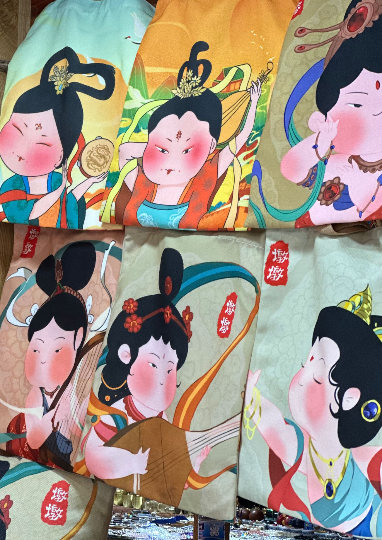Cultural and creative products are for sale at the Dunhuang Night Market in Dunhuang, Gansu Province on September 4, 2023. /CGTN