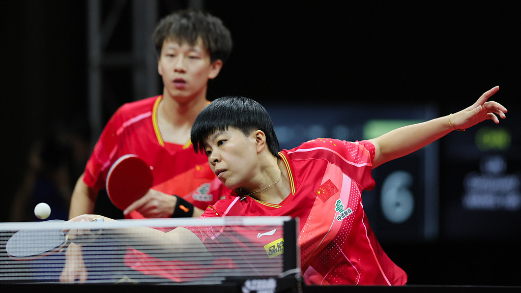 Lin Gaoyuan (L) and Wang Yidi in action during the Asian Table Tennis Championships mixed doubles semifinal round in PyeongChang, South Korea, September 7, 2023. /CFP