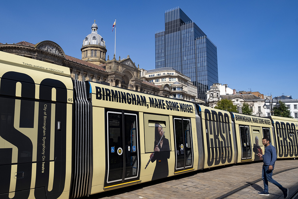 A tram passes Birmingham City Council Town Hall building in Victoria Square in Birmingham, UK, September 5, 2023. /VCG