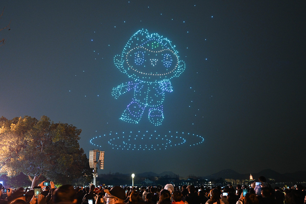 A photo taken on February 21, 2022 shows a light show with drones forming the shape of mascot Chenchen, marking the 200-day countdown to the 19th Asian Games in Hangzhou, Zhejiang. /CFP