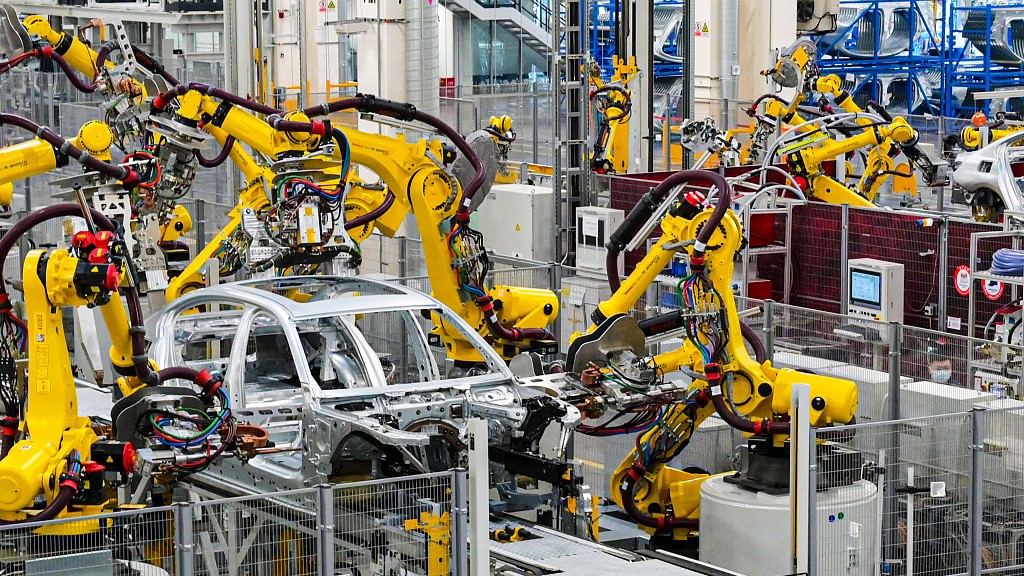 Robot arms operating in a BMW Brilliance factory in Shenyang, northeast China's Liaoning Province. February 6, 2023. /CFP